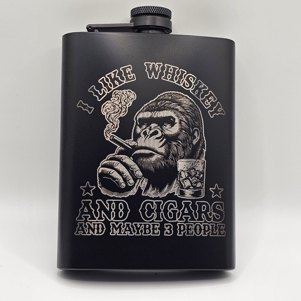 Black flask with engraved design and text on a white background