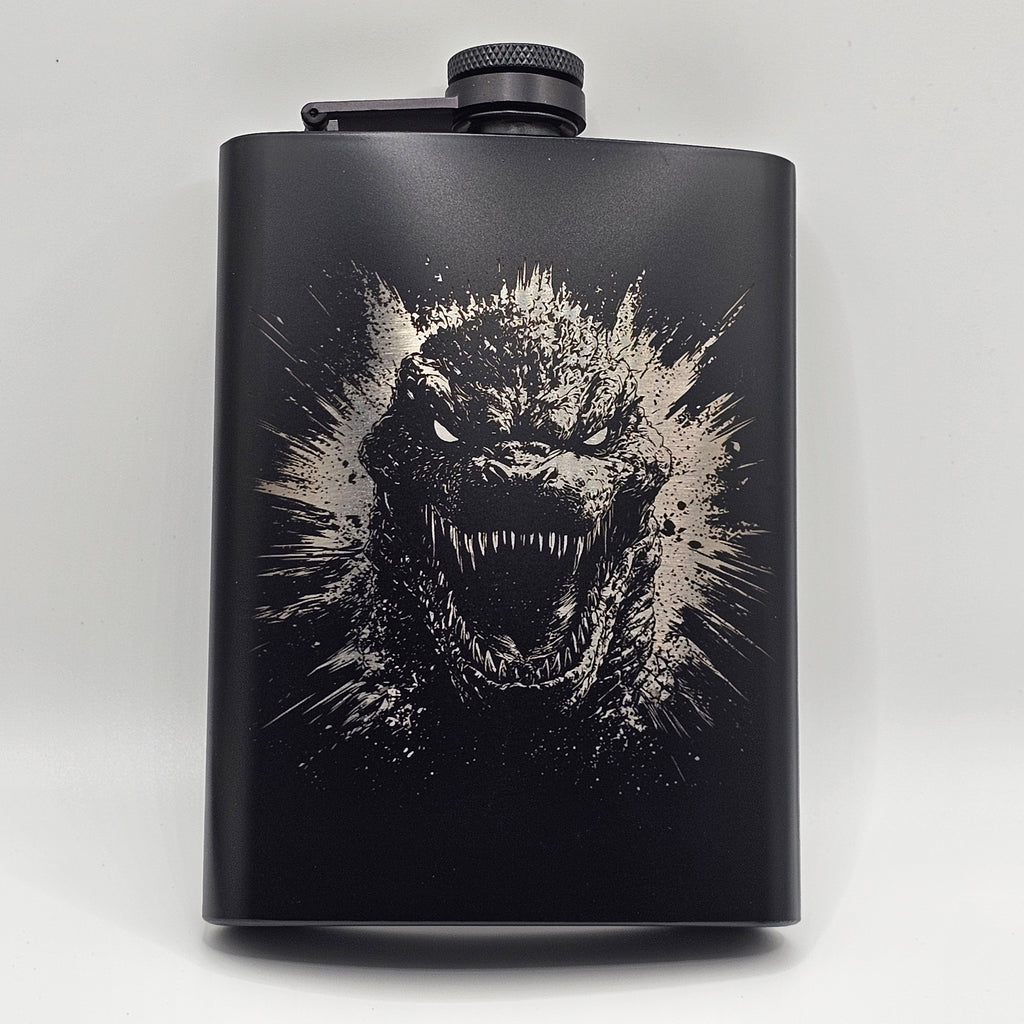 Black flask with a Godzilla design