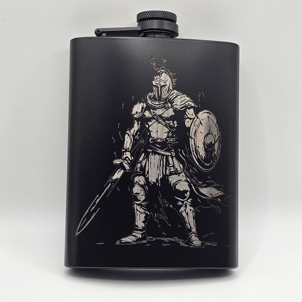 Black flask with engraved design of a warrior on a white background