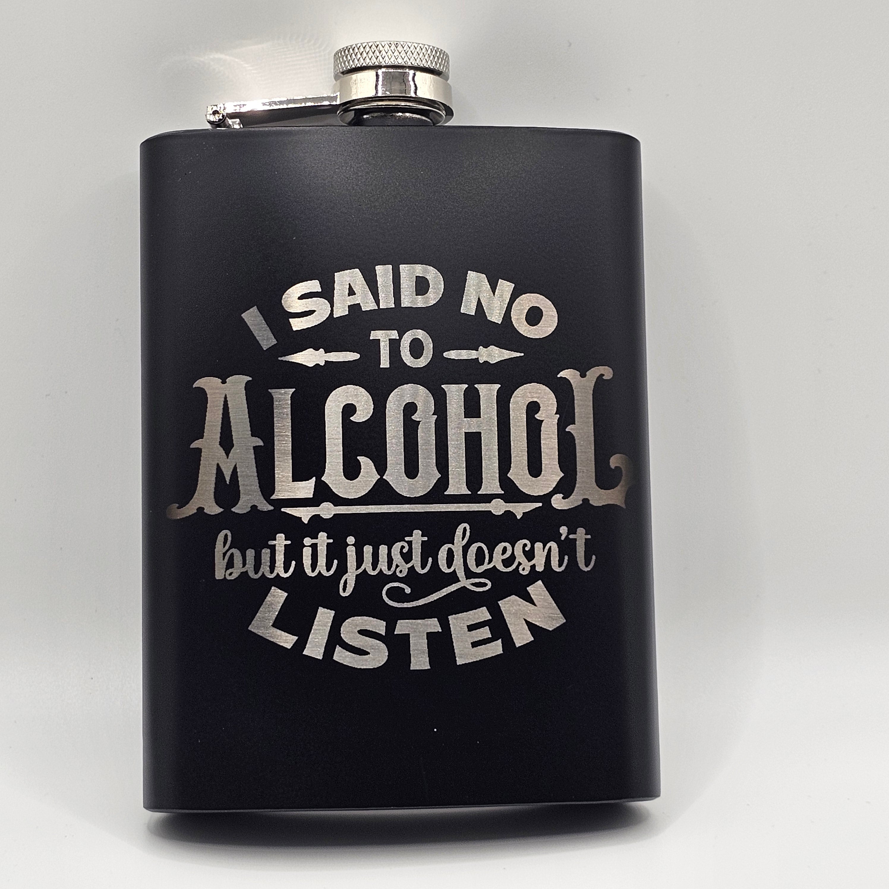 Black flask with humorous text design on a light gray background
