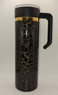 Black tumbler with cat pattern and gold accents on a white background