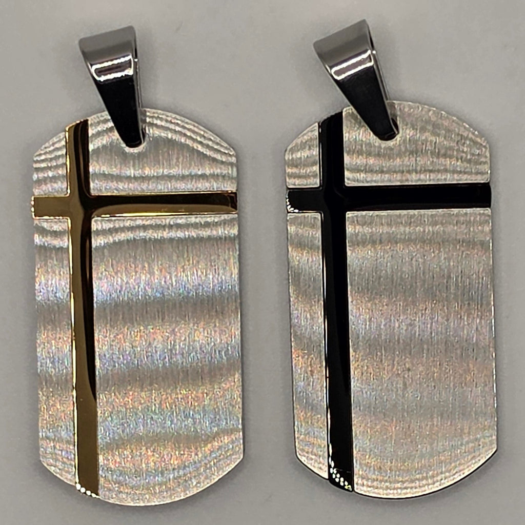 Pair of silver cufflinks with black accents on a gray background