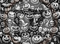 Halloween-themed design with pumpkins, skulls, and other elements on a black background.