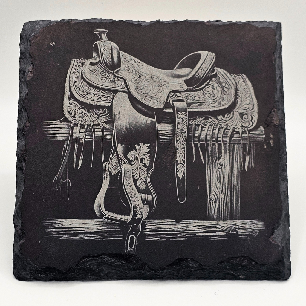 Decorative slate with a detailed illustration of a horse saddle and bridle on a white background