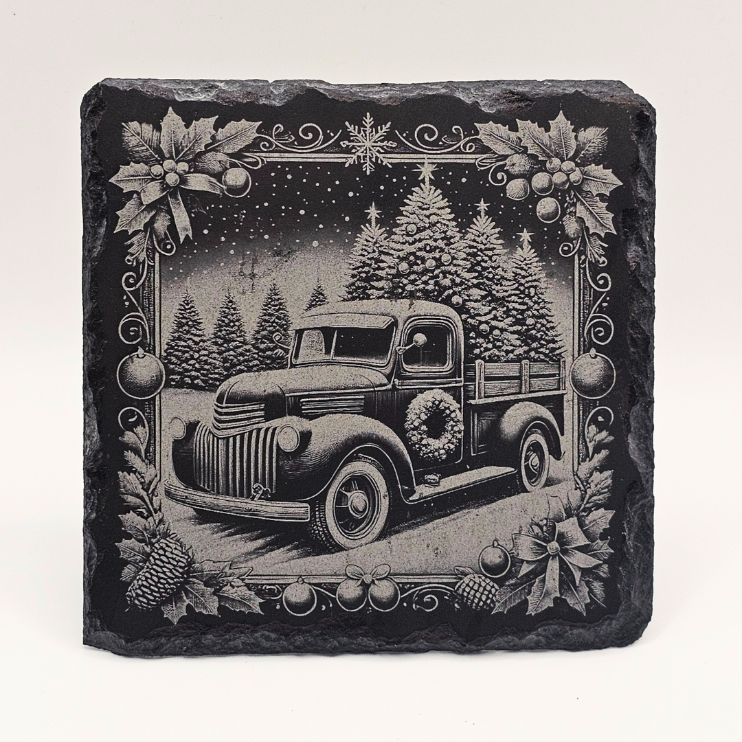 Decorative stone with a vintage truck and Christmas trees design on a white background