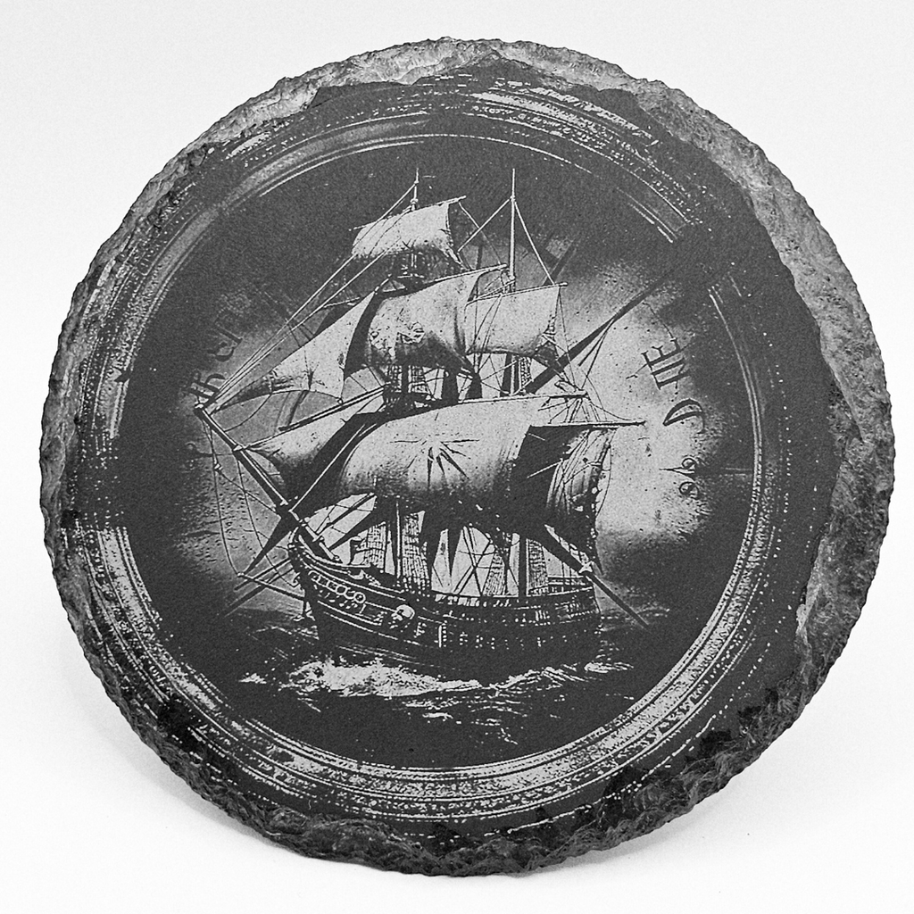Decorative stone with a ship engraving on a white background