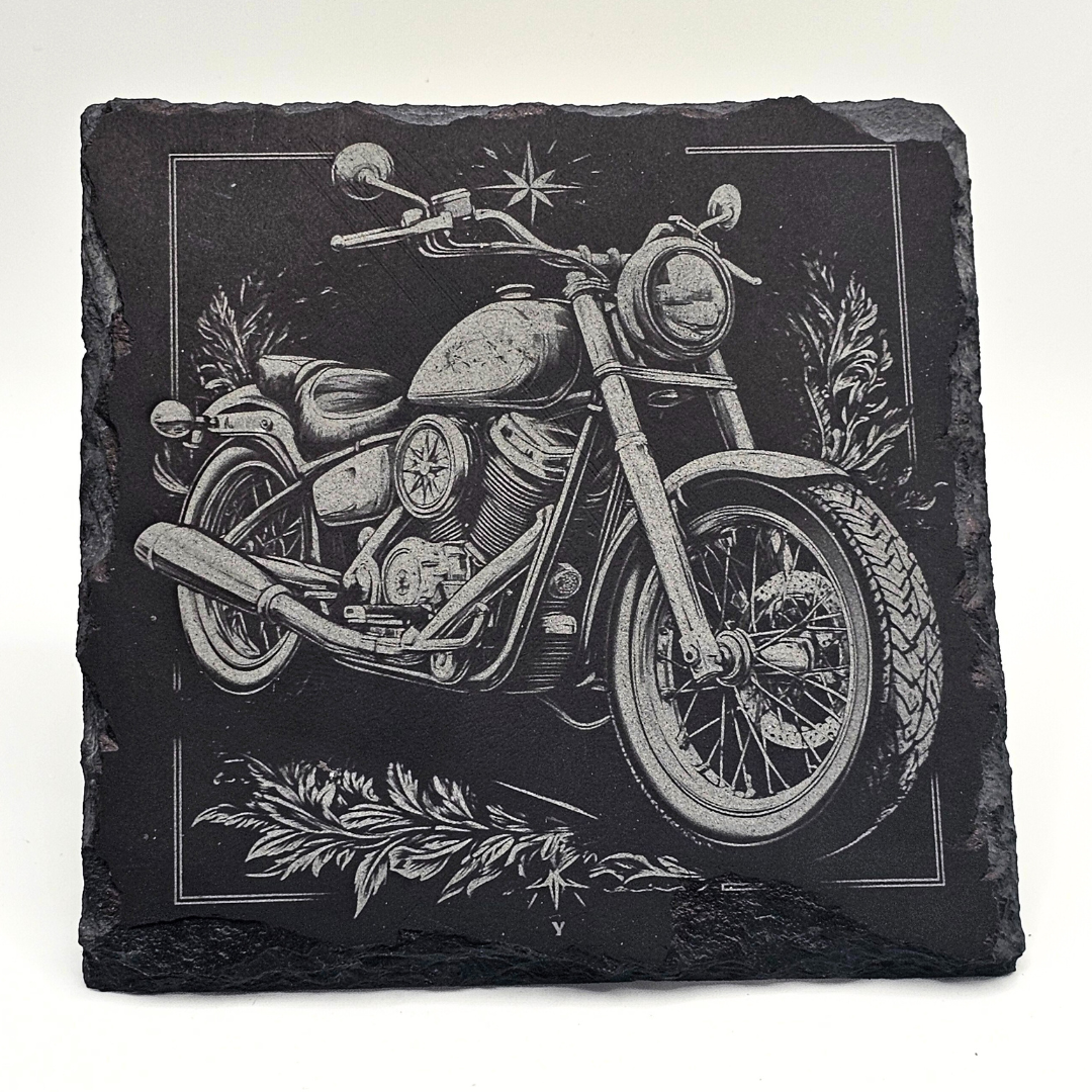 Slate coaster with a motorcycle engraving on a white background