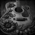 Wooden acoustic guitar with floral and leaf designs on a dark background
