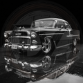 Black and white classic car in a tunnel