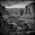 Black and white photograph of a canyon with a river running through it