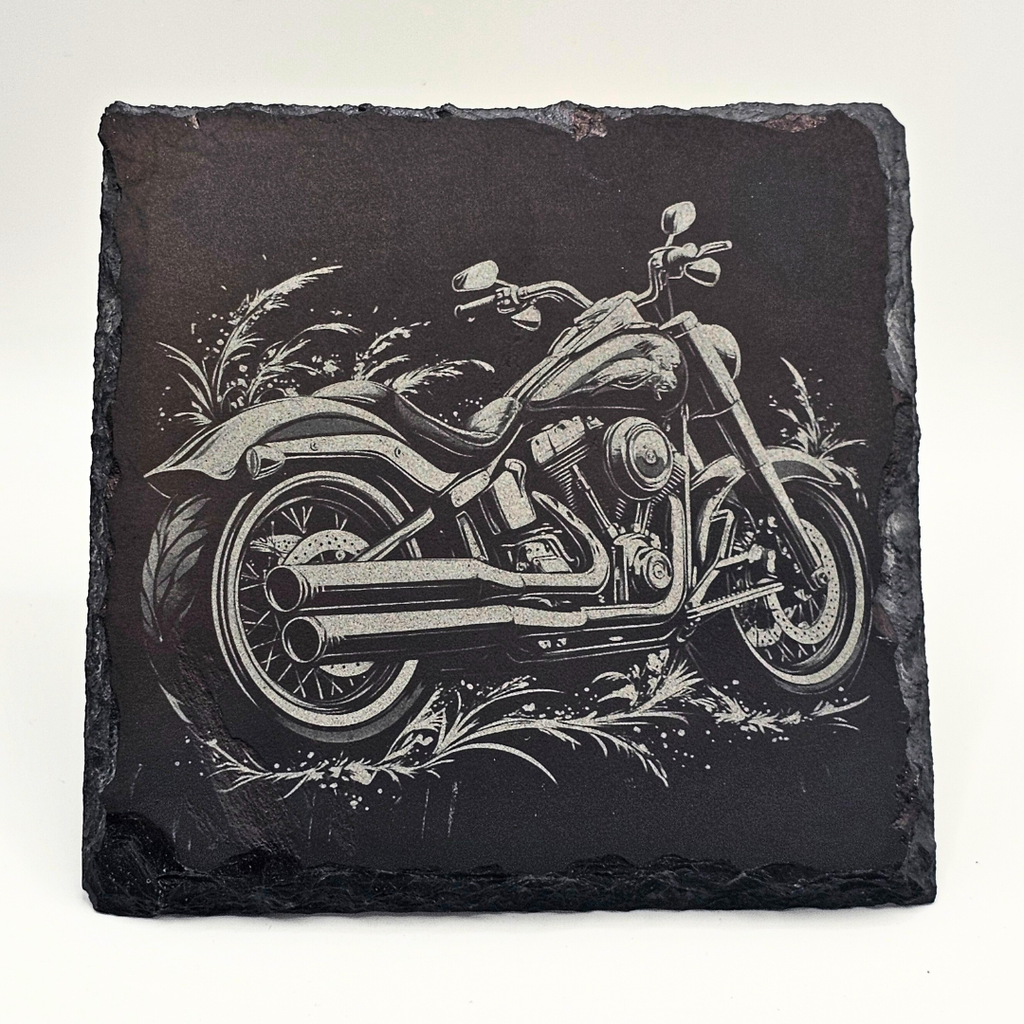 Slate coaster with a motorcycle design on a white background