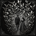 Black and white illustration of a couple walking through a tunnel of doves with a castle in the background.