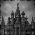 Black and white image of a grand cathedral with multiple domes on a cloudy day.