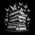 Stack of books with butterflies on a black background