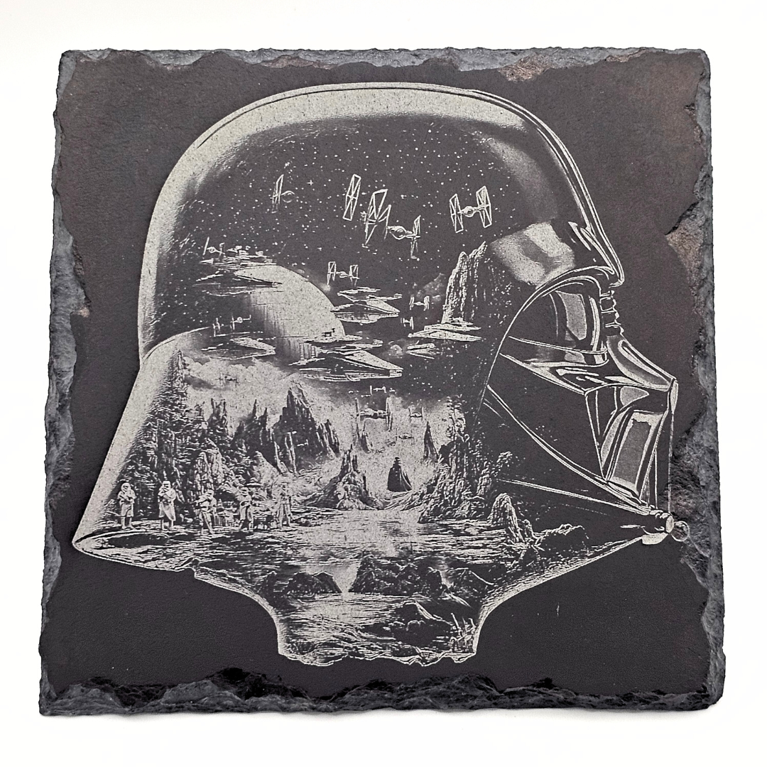 Slate coaster with Darth Vader helmet design and space scene etched on it